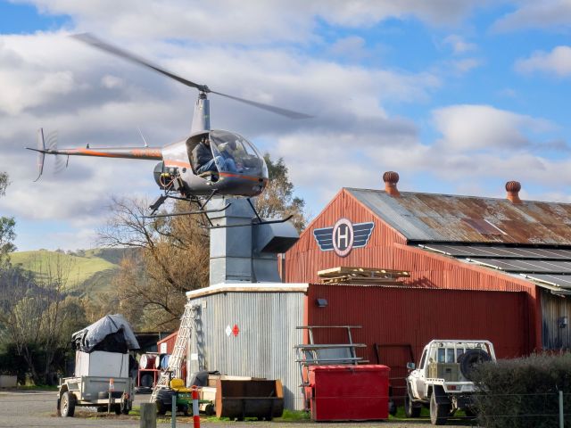 Helicopter landing at a farm