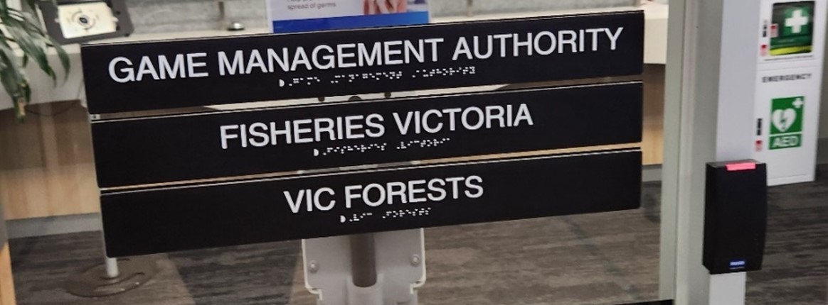 Sign saying game management authority, fisheries and vic forests. These are also in Braille